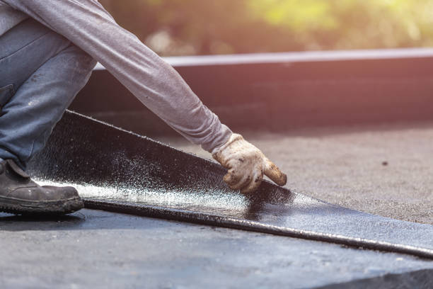 Professional Basement Waterproofing technician working in Worthington, IN